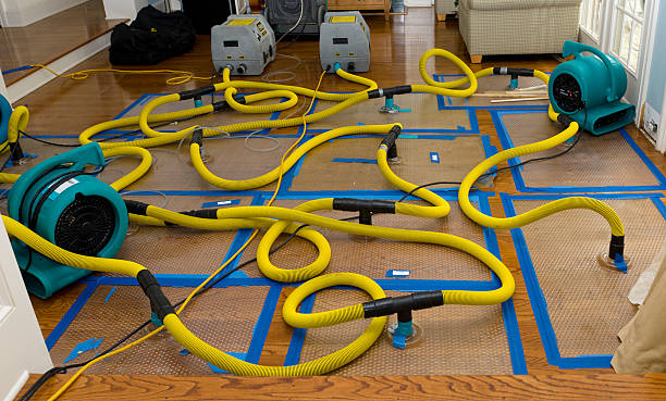 Professional Storm Water Damage Restoration technician working in Leominster, MA